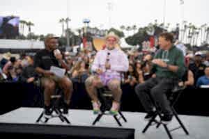Jason Ellis and Tony Hawk being interviewed in front of a crowd of fans at X Games